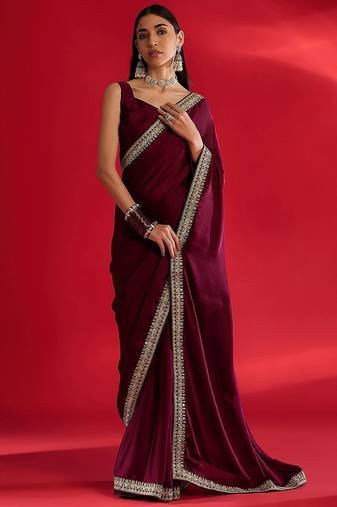 Rust ethnic motifs satin block print saree