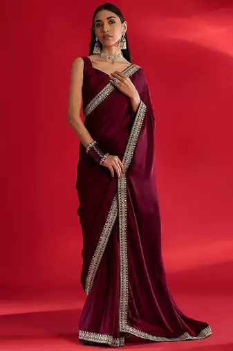 Rust ethnic motifs satin block print saree