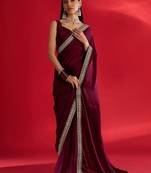Rust ethnic motifs satin block print saree