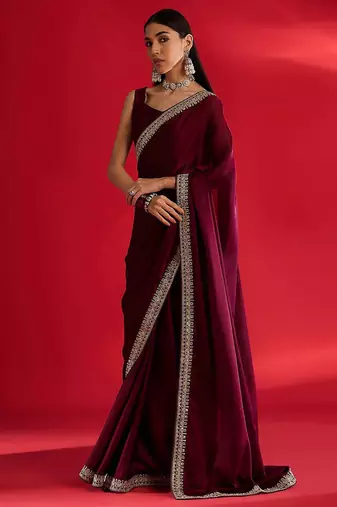 Rust ethnic motifs satin block print saree