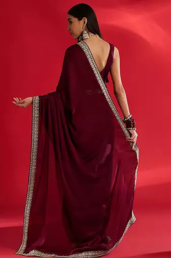 Rust ethnic motifs satin block print saree