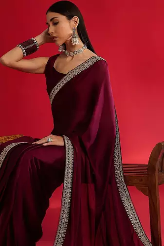 Rust ethnic motifs satin block print saree