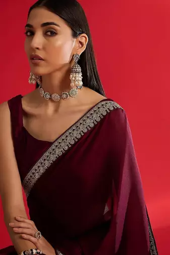 Rust ethnic motifs satin block print saree