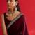 Rust ethnic motifs satin block print saree