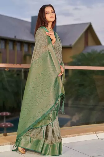 green ethnic motifs woven design saree