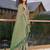 green ethnic motifs woven design saree