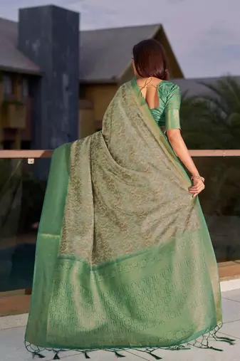 green ethnic motifs woven design saree
