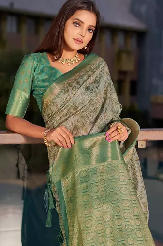 green ethnic motifs woven design saree