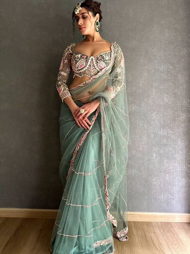 sea_green embellished embroidered net saree with unstitched blouse piece