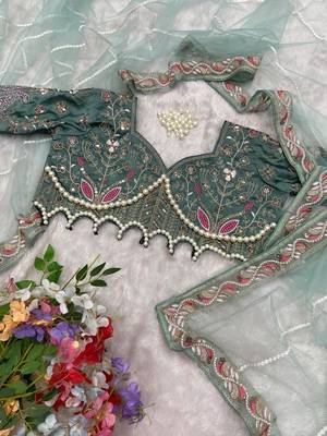 sea_green embellished embroidered net saree with unstitched blouse piece 5
