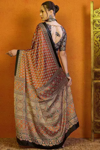 rust ethnic motifs satin block print saree