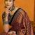 rust ethnic motifs satin block print saree