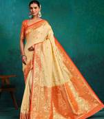cream ethnic motifs woven design zari banarasi saree
