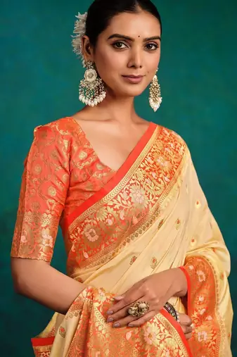 cream ethnic motifs woven design zari banarasi saree