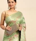 green ethnic motifs zari organza saree