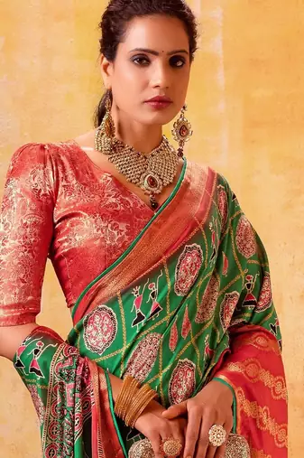 peach ethnic motifs zari patola saree