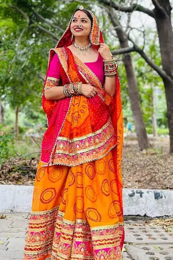 yellow yellow & red printed gotta patti bandhani saree