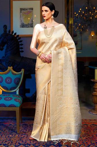cream cream-coloured & gold-toned woven design zari silk blend kanjeevaram saree