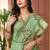 green green & red ethnic motifs embroidered zari saree