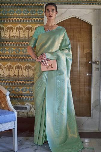 sea_green sea green & gold-toned ethnic motifs zari saree
