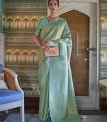 sea_green sea green & gold-toned ethnic motifs zari saree