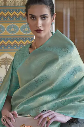 sea_green sea green & gold-toned ethnic motifs zari saree
