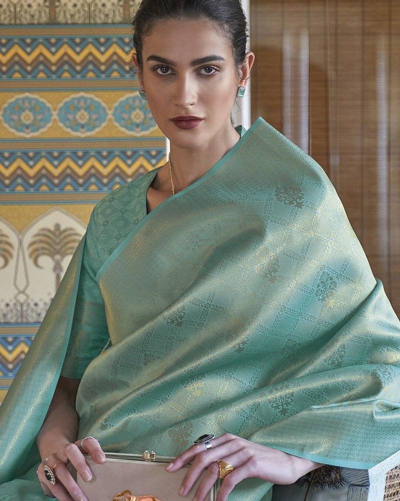 sea_green sea green & gold-toned ethnic motifs zari saree
