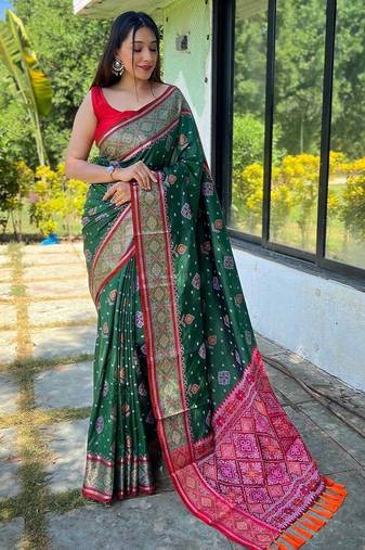 green green & pink woven design ethnic motifs zari silk blend patola saree