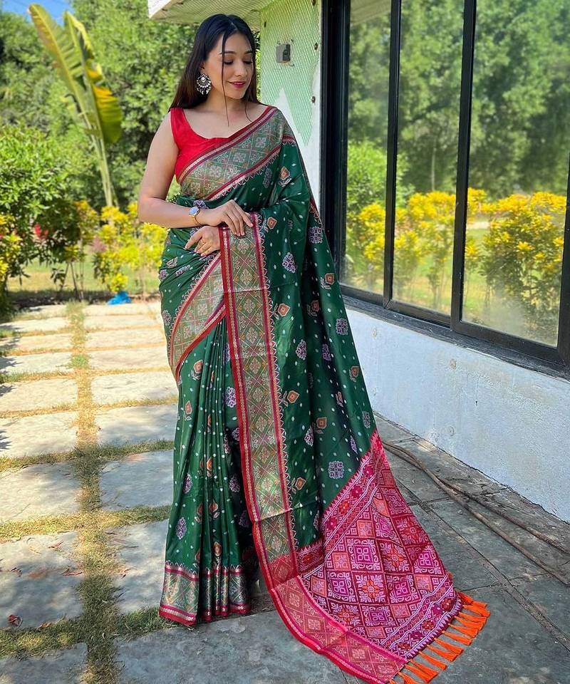 green green & pink woven design ethnic motifs zari silk blend patola saree