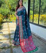 teal teal & red ethnic motifs woven design zari patola saree