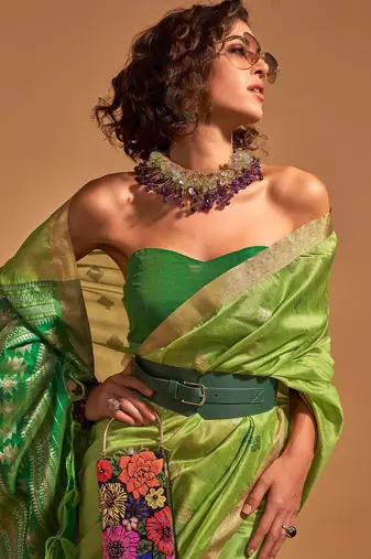 green woven design zari silk banarasi saree