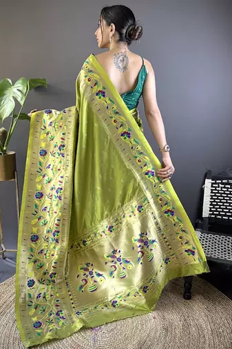 green woven design zari paithani saree with unstitched blouse piece