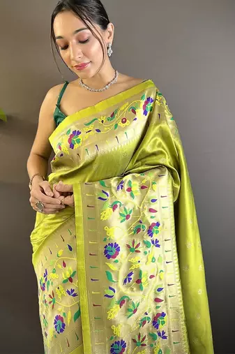 green woven design zari paithani saree with unstitched blouse piece