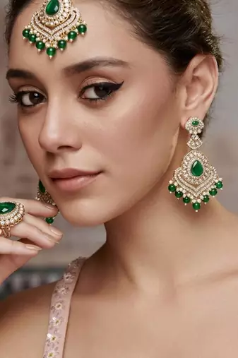 gold-plated kundan maang tika and earrings