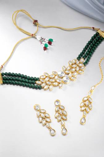 green & gold-toned kundan studded jewellery set