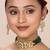 green & gold-toned kundan studded jewellery set