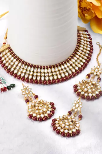 gold-plated kundan-studded jewellery set