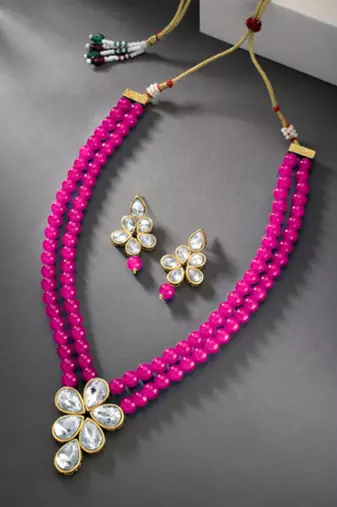 gold-plated kundan-studded & beaded layered jewellery set