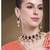 women gold-plated kundan studded necklace with earrings