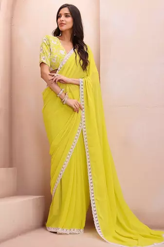yellow embroidered saree with blouse piece