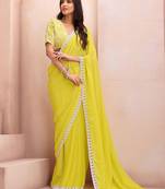 yellow embroidered saree with blouse piece