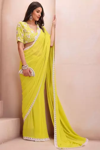 yellow embroidered saree with blouse piece
