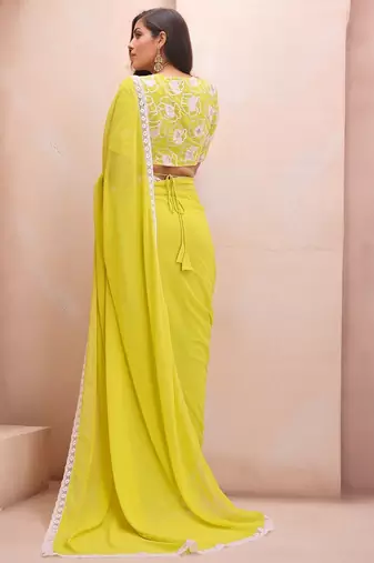 yellow embroidered saree with blouse piece