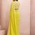 yellow embroidered saree with blouse piece