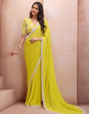 yellow embroidered saree with blouse piece 4
