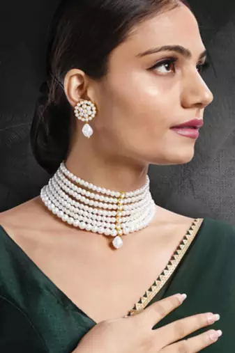 gold-plated stone studded & beaded jewellery set
