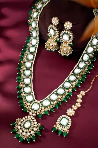 green kundan studded long necklace earrings and maangtikka set ethnic jewellery for women