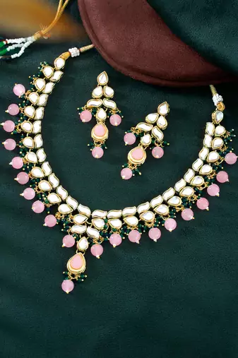 gold-plated kundan-studded jewellery set
