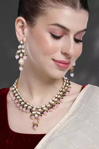 gold-plated kundan-studded jewellery set