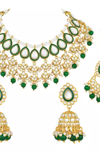 gold-plated kundan studded choker jewellery set with maang tikka